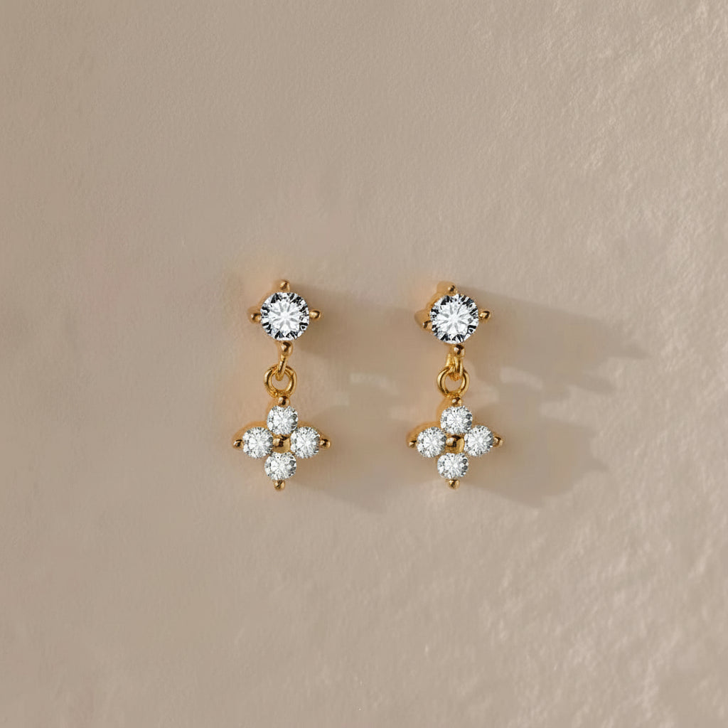 Gold earrings with zircon crystals