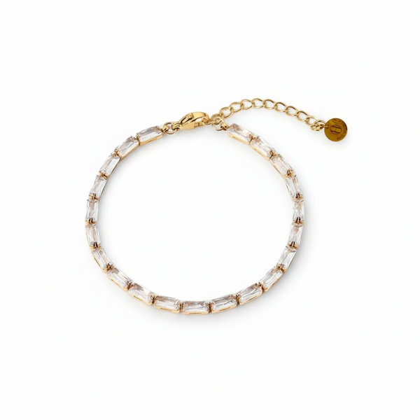 Gold plated bracelet with a rectangular cut design, featuring gold-colored beads and a sliding adjustment mechanism.